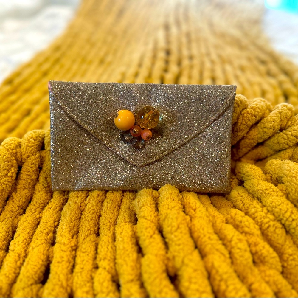 Gold sparkly Miss Albright Specialty Clutch